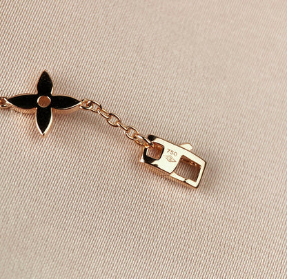 [ヴィッキー]星と太陽 7モチーフ ゴールドブレスレット