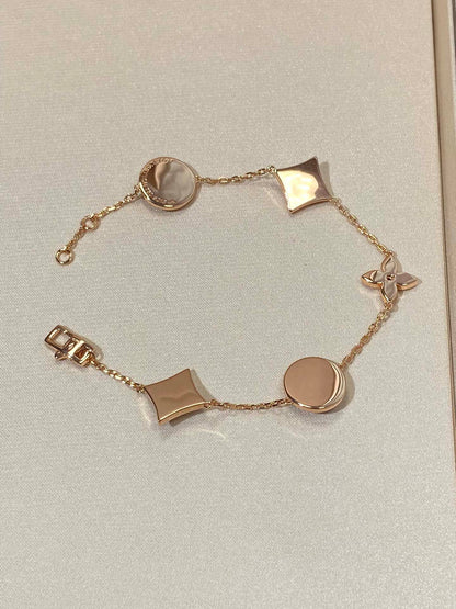 [Vicky]STAR AND SUN 5 MOTIF MOP PINK GOLD BRACELET